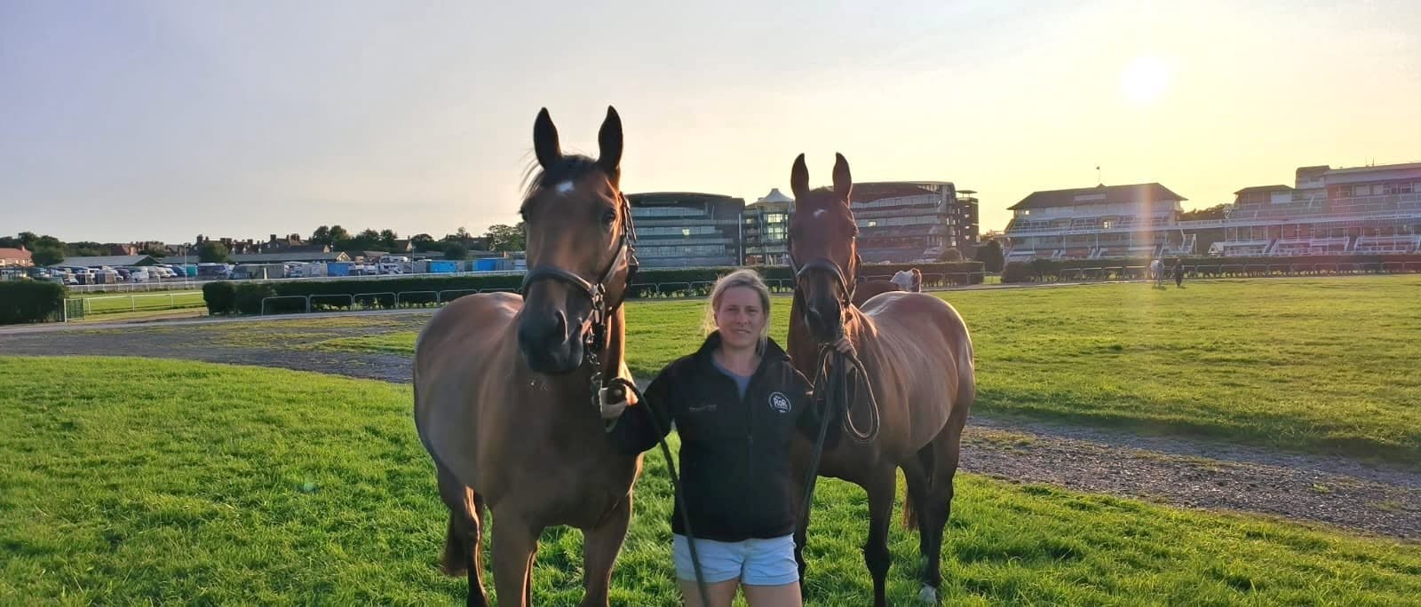 Aimée with two thoroughbreds